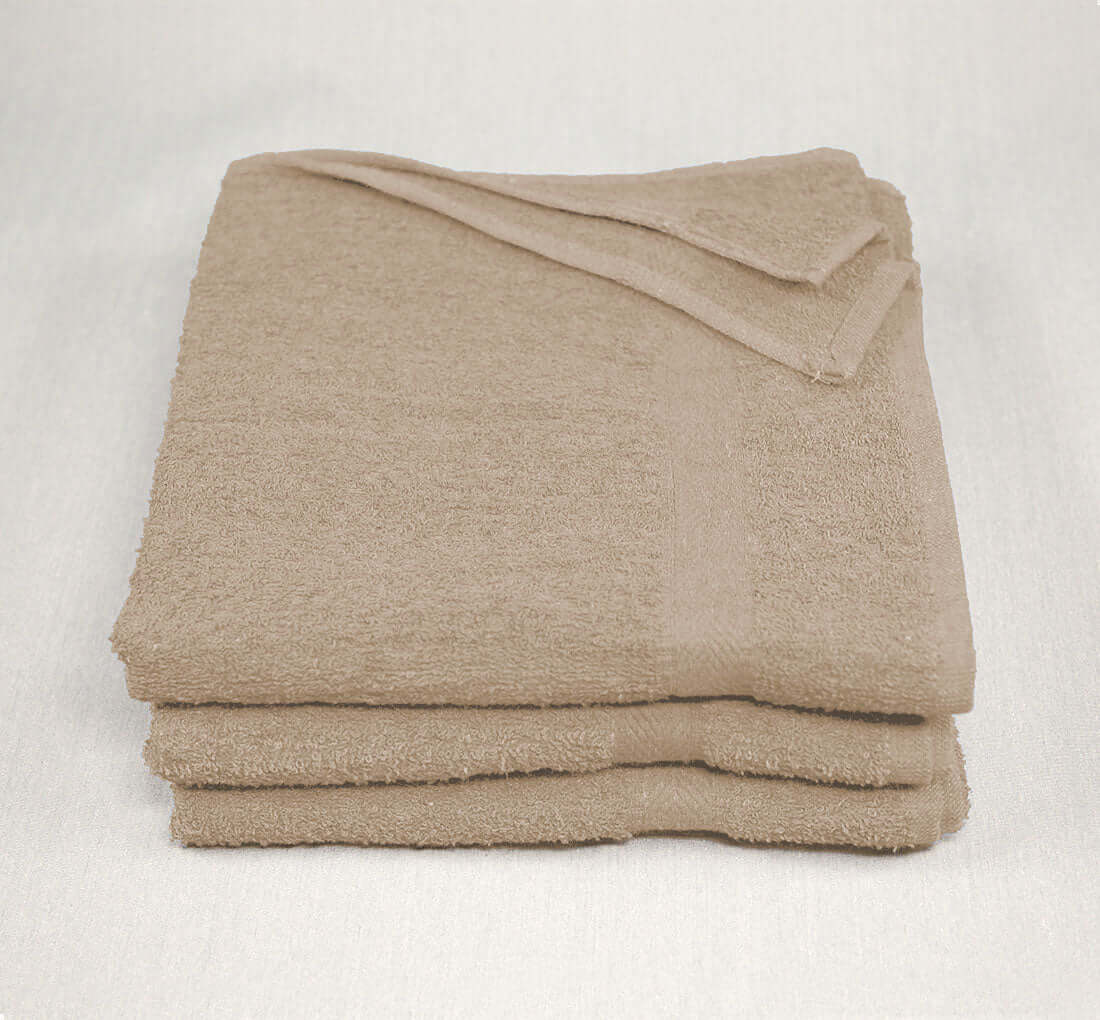https://wholesaletowel.com/cdn/shop/products/22x44-Tan-Towels-6.25.jpg?v=1685994805&width=1445